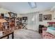 Cozy living room with natural light, bookshelves, and comfortable seating at 6311 Xavier St, Arvada, CO 80003