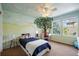 Whimsical bedroom with painted mural, twin bed, desk, and carpeted floor at 2861 Madison Ln, Broomfield, CO 80023
