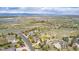 Breathtaking aerial view of the neighborhood with lakes, mountains, and open spaces at 3225 Rinn Valley Dr, Longmont, CO 80504