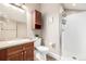 Cozy bathroom showcasing a stand-up shower, vanity with storage, and neutral tones creating a serene space at 3225 Rinn Valley Dr, Longmont, CO 80504
