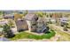 Charming two-story home with manicured lawn and white picket fence in a desirable neighborhood at 3225 Rinn Valley Dr, Longmont, CO 80504