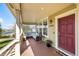 Inviting front porch with comfortable seating and a view of the neighborhood at 3225 Rinn Valley Dr, Longmont, CO 80504