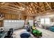 Spacious garage with two doors, exposed rafters, and plenty of space for storage and vehicles at 3225 Rinn Valley Dr, Longmont, CO 80504