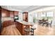 Gourmet kitchen features custom cabinetry, sleek countertops, and a breakfast bar area at 3225 Rinn Valley Dr, Longmont, CO 80504
