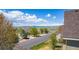 Scenic street view of neighborhood with mountain views at 3225 Rinn Valley Dr, Longmont, CO 80504