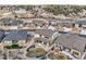 An aerial shot showcasing a well-designed home with a landscaped backyard and a community feel at 7897 S Jamestown Ct, Aurora, CO 80016