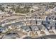 Aerial view of a neatly arranged residential area with similar-style homes and well-kept lawns at 7897 S Jamestown Ct, Aurora, CO 80016