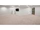 Spacious finished basement with neutral carpeting, recessed lights and a tv viewing area at 424 Arbor Dr, Lafayette, CO 80026
