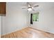 Airy bedroom with hardwood floors and a ceiling fan with pleasant natural light at 424 Arbor Dr, Lafayette, CO 80026