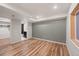 Finished bedroom featuring hardwood floors, recessed lighting and an en-suite bathroom at 424 Arbor Dr, Lafayette, CO 80026