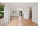 Bright, open living area featuring hardwood floors with open flow to foyer, kitchen, and entry way at 424 Arbor Dr, Lafayette, CO 80026