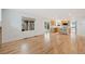 Open concept living room connects to kitchen and features hardwood floors at 424 Arbor Dr, Lafayette, CO 80026