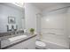 Clean bathroom featuring tub-shower combination, granite countertop, and neutral finishes at 360 S Estes St # C, Lakewood, CO 80228