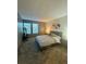 Cozy bedroom featuring plush carpet, natural light, and stylish decor at 360 S Estes St # C, Lakewood, CO 80228