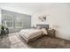 Bright bedroom with large windows, soft carpeting and stylish furniture at 360 S Estes St # C, Lakewood, CO 80228