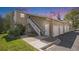 Inviting home featuring a two-story layout, garages, and individual entrances for each unit at 360 S Estes St # C, Lakewood, CO 80228