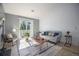Relaxing living room filled with natural light and sliding glass doors that lead to the outside at 360 S Estes St # C, Lakewood, CO 80228