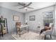 Well-lit home office with a modern desk, comfortable seating, and a cozy rug at 360 S Estes St # C, Lakewood, CO 80228