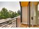 Balcony offers an outdoor retreat with wood floors and views of trees at 3439 N High St, Denver, CO 80205