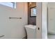 Contemporary powder room featuring a unique pedestal sink, modern fixtures, and stylish wall accents at 3439 N High St, Denver, CO 80205