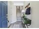 Inviting entryway with stylish console table and staircase creating a warm welcome at 2945 W Riverwalk Cir # B, Littleton, CO 80123