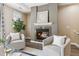 Inviting living area featuring a fireplace and a sitting area with lots of natural light at 2945 W Riverwalk Cir # B, Littleton, CO 80123