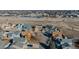 An aerial view of residential homes in a suburban neighborhood at 1387 Sunnyside St, Highlands Ranch, CO 80126