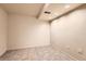 Basement area featuring tile flooring and updated ceiling lighting at 367 Jupiter Dr, Lone Tree, CO 80124