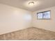 Cozy bedroom with neutral carpet and a bright window, offering a blank canvas for personalization at 367 Jupiter Dr, Lone Tree, CO 80124