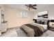 Comfortable bedroom with soft lighting, a large window, and stylish decor creating a relaxing retreat at 367 Jupiter Dr, Lone Tree, CO 80124