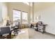 Bright office space with natural light, artist desk, and large windows offering neighborhood views at 8165 E Lowry Blvd # 310, Denver, CO 80230