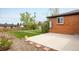Backyard featuring a concrete patio and healthy green lawn at 740 Lotus Way, Broomfield, CO 80020