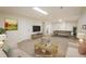 Staged basement with a pool table and comfortable sitting area at 740 Lotus Way, Broomfield, CO 80020