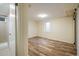 Bedroom with vinyl floors and a bathroom at 740 Lotus Way, Broomfield, CO 80020