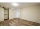 Bedroom with vinyl floors and an open closet space at 740 Lotus Way, Broomfield, CO 80020