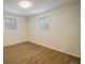 Cozy bedroom with hardwood flooring and bright, natural light at 740 Lotus Way, Broomfield, CO 80020