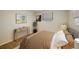 Calm bedroom featuring wood floors, soft lighting, and neutral paint creating a peaceful sanctuary at 740 Lotus Way, Broomfield, CO 80020