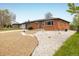 Charming brick home with well-maintained yard and gravel landscaping at 740 Lotus Way, Broomfield, CO 80020