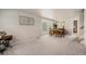 Large dining room area with large window for natural light and view to the backyard at 15901 E 106Th Way, Commerce City, CO 80022