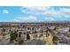 Aerial view of a residential neighborhood with a pond and green space at 23 Carla Way, Broomfield, CO 80020