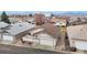 Aerial view of a cozy home with a garage, surrounded by a well-kept neighborhood and mountain views at 23 Carla Way, Broomfield, CO 80020