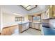 Kitchen featuring an island, natural lighting, and modern appliances for a culinary delight at 23 Carla Way, Broomfield, CO 80020