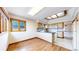 Kitchen features wood floors, natural light, and modern appliances for a cozy cooking experience at 23 Carla Way, Broomfield, CO 80020