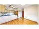 Bright kitchen with wood cabinets, plenty of counter space, and a tiled floor at 23 Carla Way, Broomfield, CO 80020