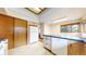 Kitchen area with modern appliances, ample storage, and a functional layout at 23 Carla Way, Broomfield, CO 80020