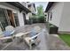 Outdoor patio with lounge chairs, a small side table, and planter boxes at 1152 S Ogden St, Denver, CO 80210