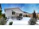 Private backyard patio with seating area; partially covered by an awning at 20 Vista Canyon Dr, Castle Rock, CO 80104