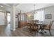 Spacious dining area with hardwood floors and large windows at 20 Vista Canyon Dr, Castle Rock, CO 80104