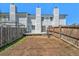 Backyard with a wooden deck and fence offers a private outdoor space at 5145 W 61St Dr # 14, Arvada, CO 80003