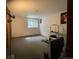 View of open basement area with window view at 8181 S Fillmore Cir, Centennial, CO 80122